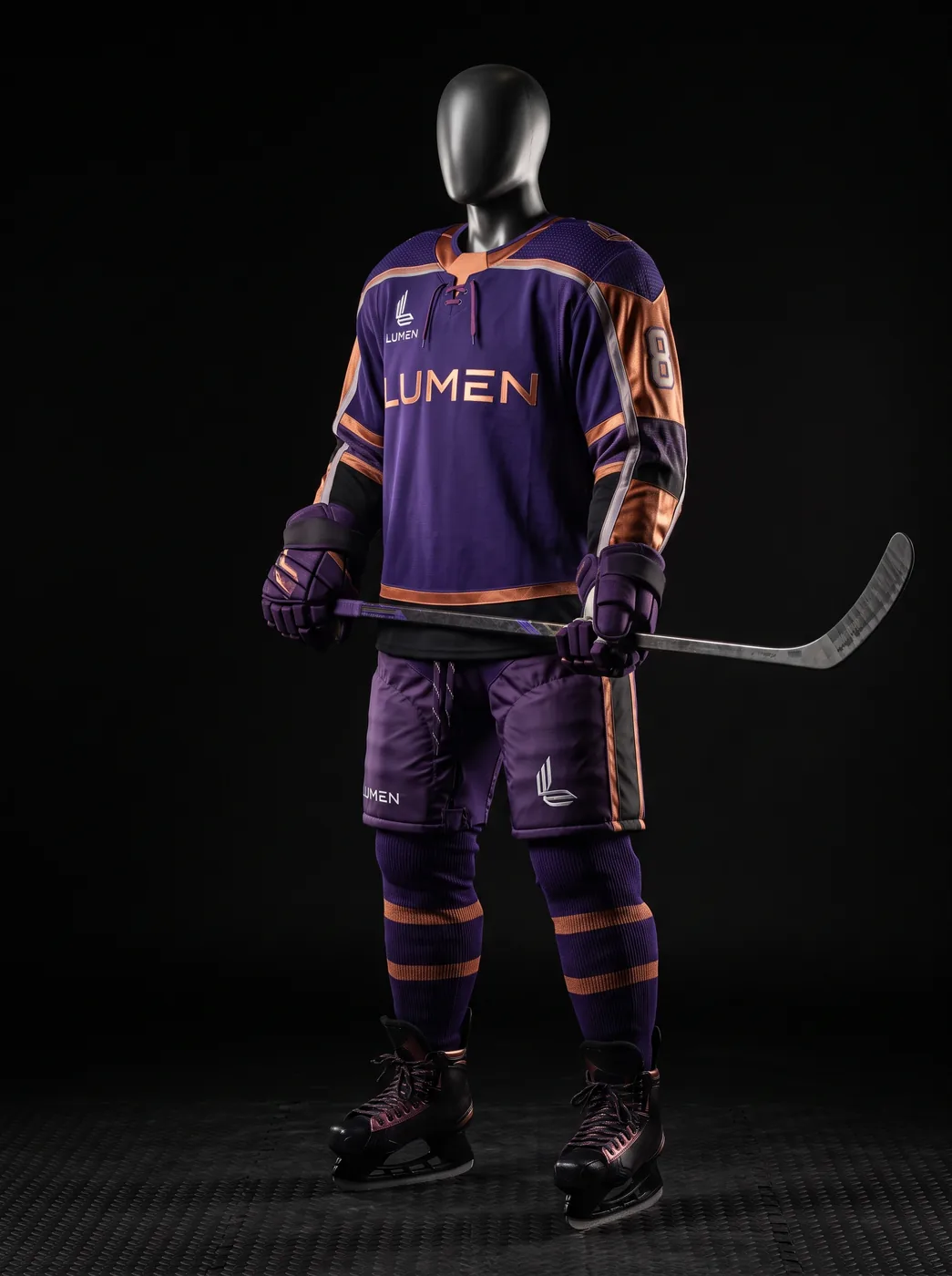 Lumen Copper custom ice hockey uniform on a mannequin