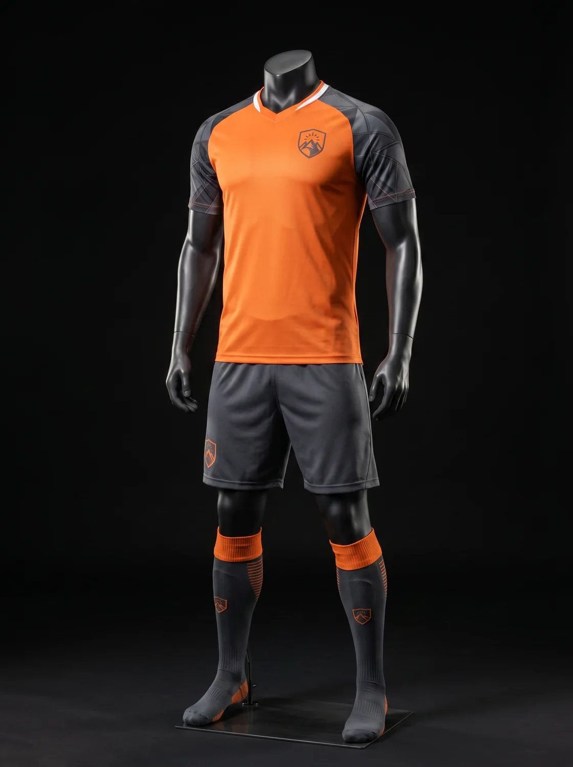 Orange and charcoal custom soccer uniform design